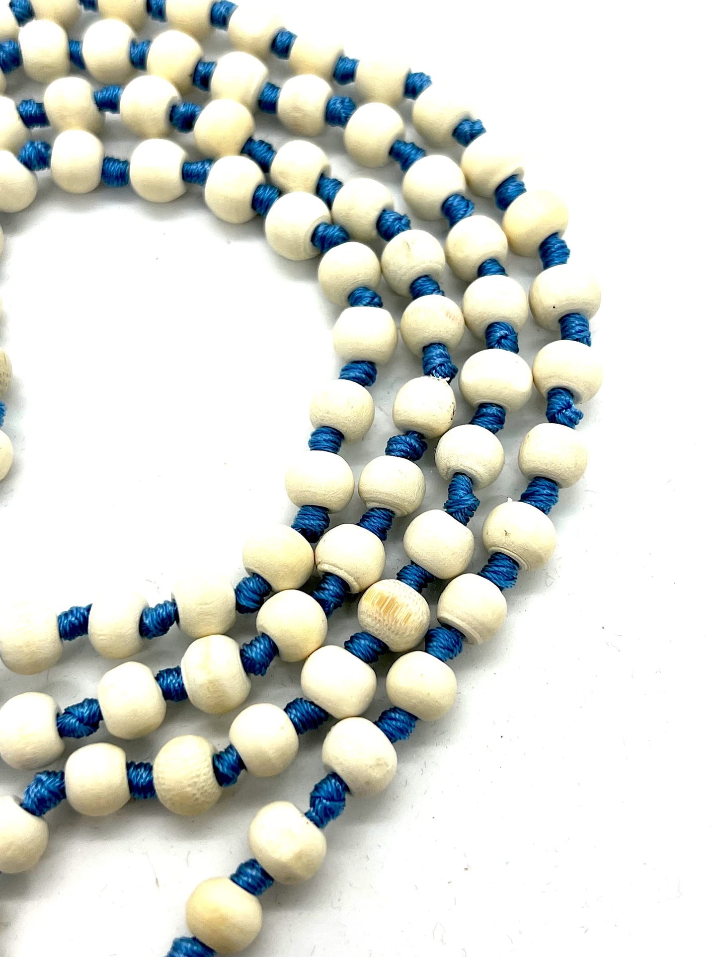 AWAKEN YOUR KUNDALINI Hand Knotted 8mm Tulsi Mala Beads Necklace with Sky Blue String and Tassel - Gemini Sun Sign, Heart Chakra Alignment