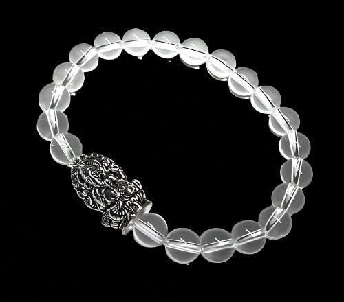 8mm Clear Crystal Quartz beaded stretch bracelet with a silver intricate Ganesha charm