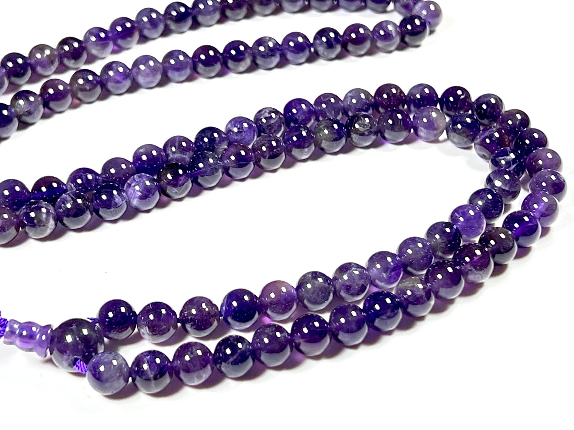 Amethyst 8mm Mala Beads Close-up Natural Stone Hand-Knotted SOMA Collection Crown Chakra Divine Connection Meditation Jewelry Spiritual Protection AYK