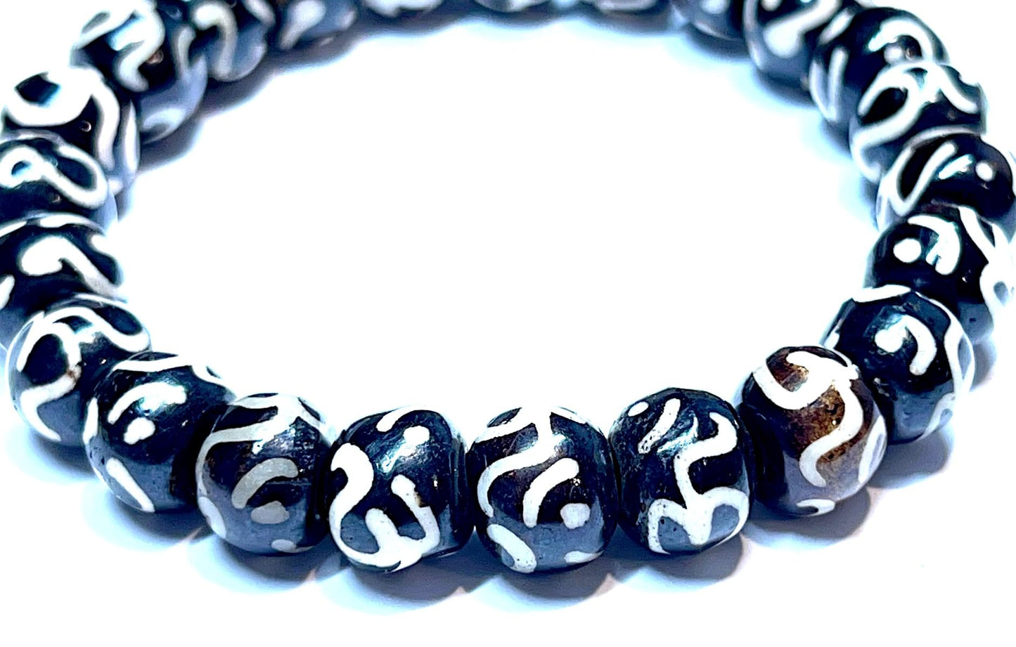 AWAKEN YOUR KUNDALINI Yak Bone Stretch Bracelet, 10mm Beads w/Om, Sagittarius Sun Sign, Crown Chakra