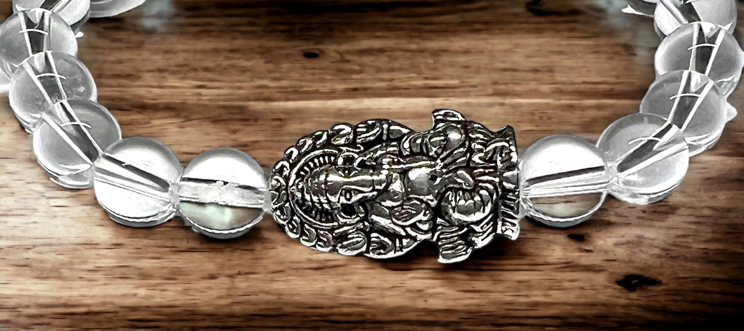 8mm Clear Crystal Quartz beaded stretch bracelet with a silver intricate Ganesha charm