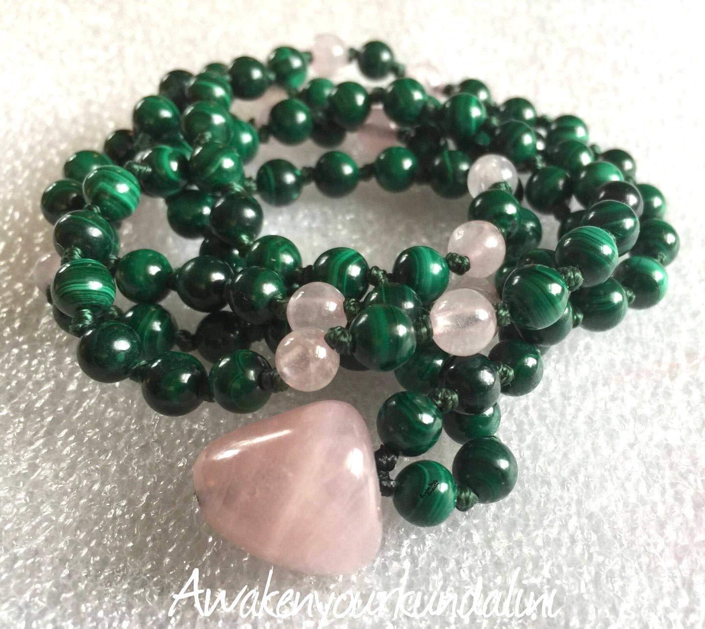 GAIA Collection Malachite & Rose Quartz mala necklace highlighting natural green and pink stone variations