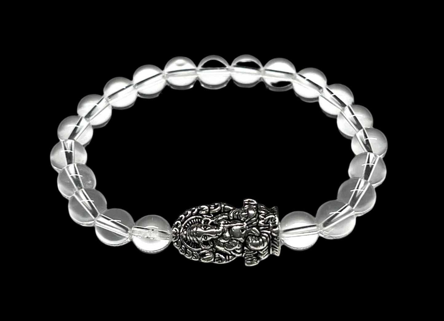 8mm Clear Crystal Quartz beaded stretch bracelet with a silver intricate Ganesha charm