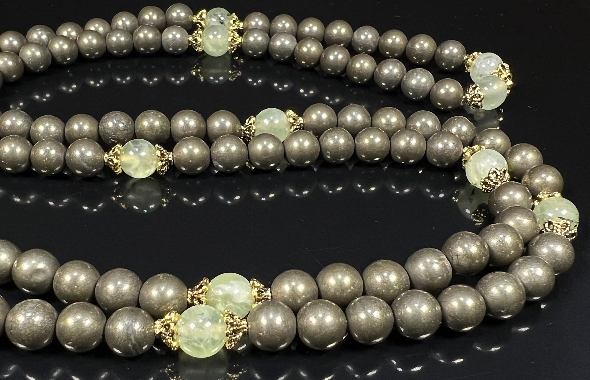 Pyrite Prehnite Mala Necklace Lifestyle Model Wearing 108 Beads HIRANYA Collection Dual Chakra Healing Abundance Manifestation Spiritual Protection Meditation Jewelry Natural Stone AYK
