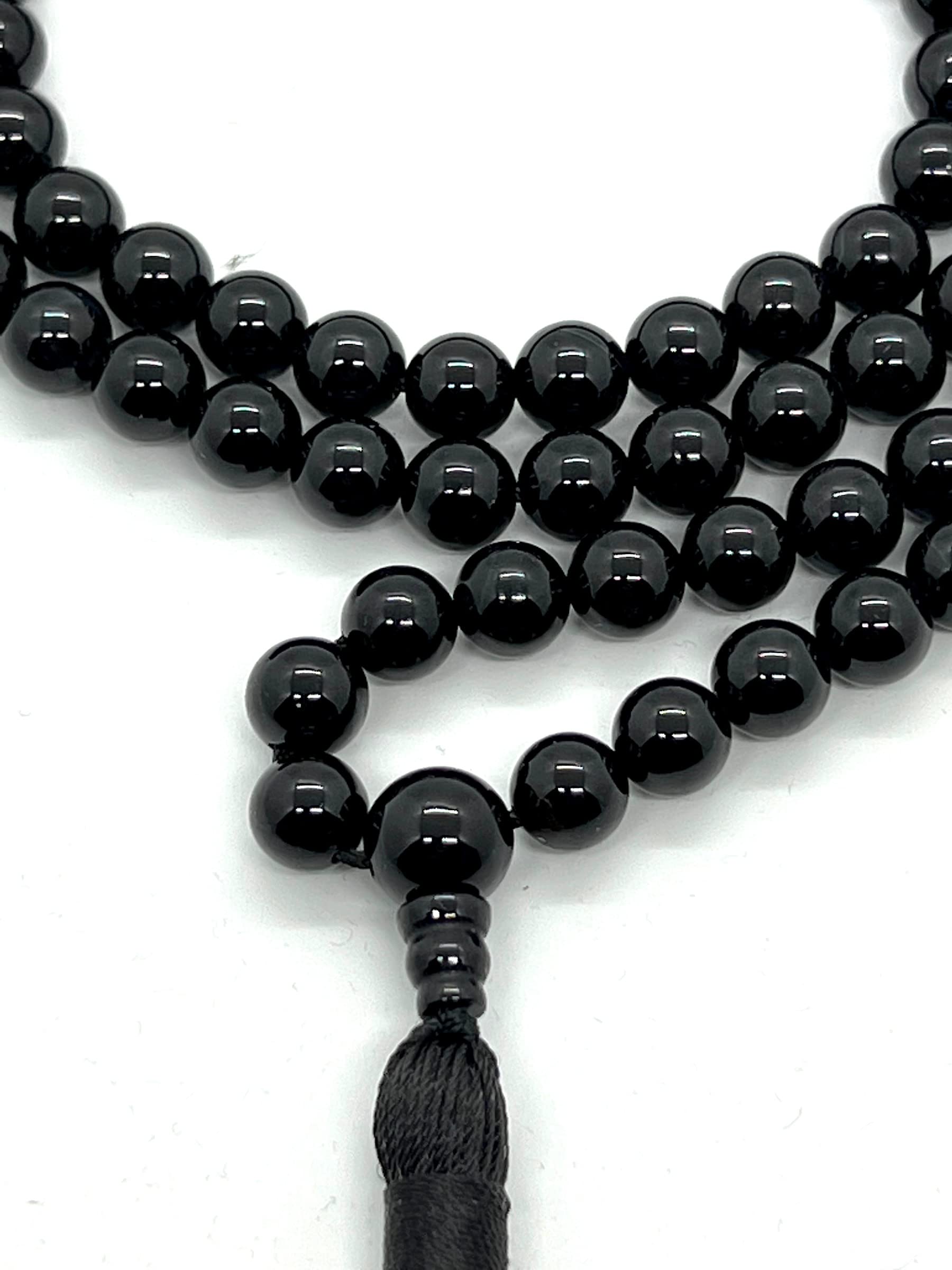 "108 Bead Black Tourmaline Mala Detail - Premium Natural Stone Texture for Spiritual Healing Jewelry"