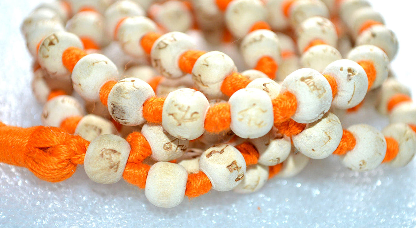 AWAKEN YOUR KUNDALINI Hand Knotted 8mm Tulsi Mala Necklace - Gemini Birthstone, Heart Chakra Alignment, Ram Engraving, Orange String & Tassel