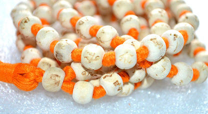 AWAKEN YOUR KUNDALINI Hand Knotted 8mm Tulsi Mala Necklace - Gemini Birthstone, Heart Chakra Alignment, Ram Engraving, Orange String & Tassel