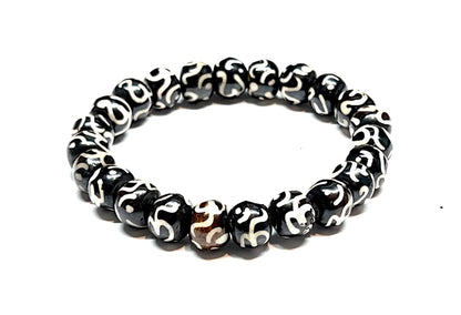 AWAKEN YOUR KUNDALINI Yak Bone Stretch Bracelet, 10mm Beads w/Om, Sagittarius Sun Sign, Crown Chakra