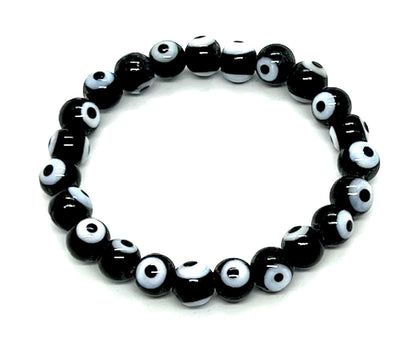 Embrace Strength & Grounding: Handmade Black Evil Eye Charm Bracelet (8mm Beads) - Scorpio Birthstone - Root Chakra Balance