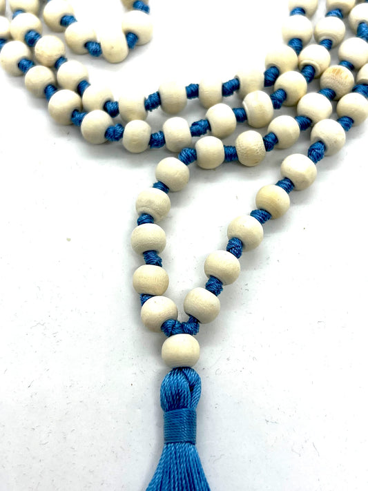 AWAKEN YOUR KUNDALINI Hand Knotted 8mm Tulsi Mala Beads Necklace with Sky Blue String and Tassel - Gemini Sun Sign, Heart Chakra Alignment