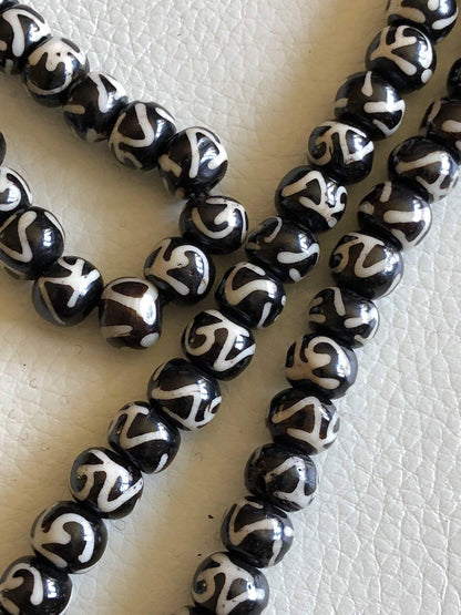 Bone mala beads necklace 108+1 Yakbone mantra chanting beads - Energized 8-10mm Tibetan beads for nirvana tantric sidhi chanting mantra w/Mala Pouch (Black with Om Script on each bead)
