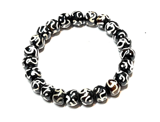 AWAKEN YOUR KUNDALINI Yak Bone Stretch Bracelet, 10mm Beads w/Om, Sagittarius Sun Sign, Crown Chakra