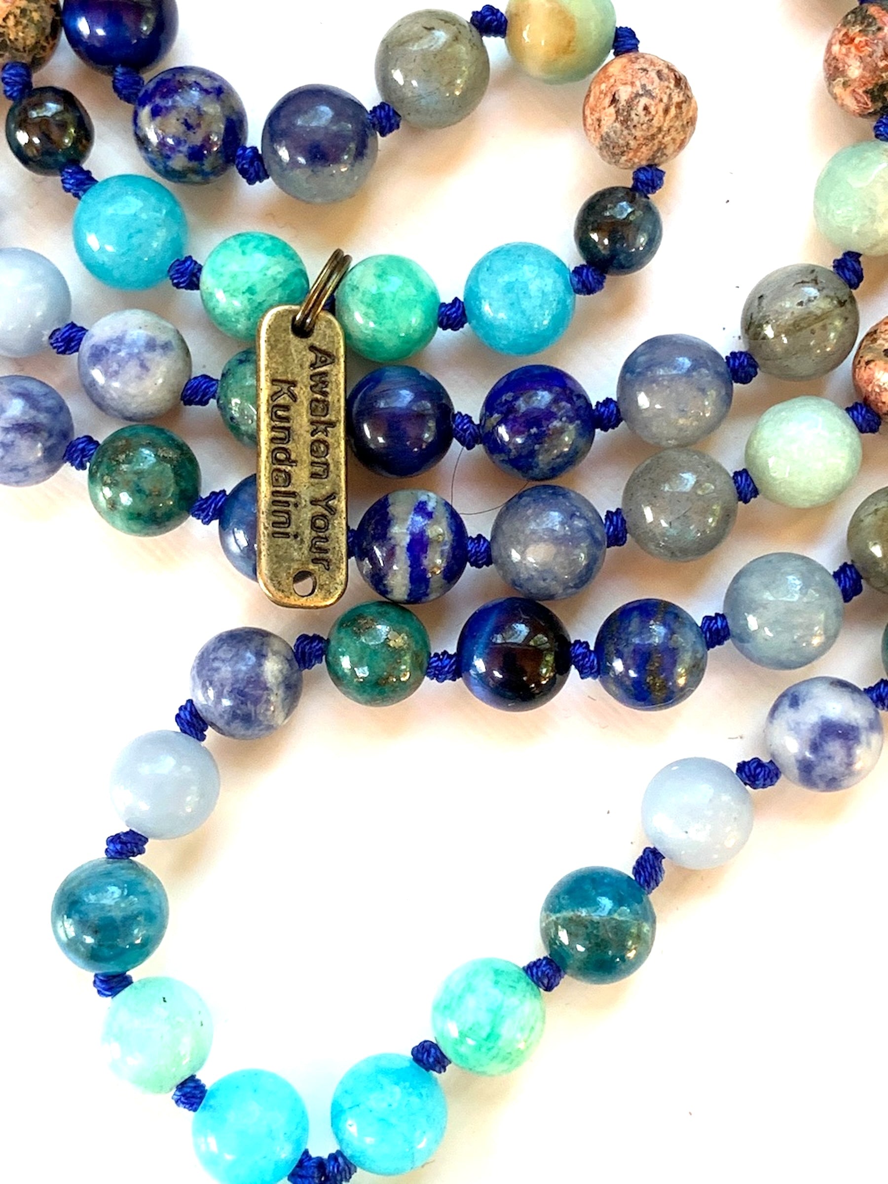Hand-knotted 108 bead Sacred Voice Mala for throat chakra healing and authentic self-expression