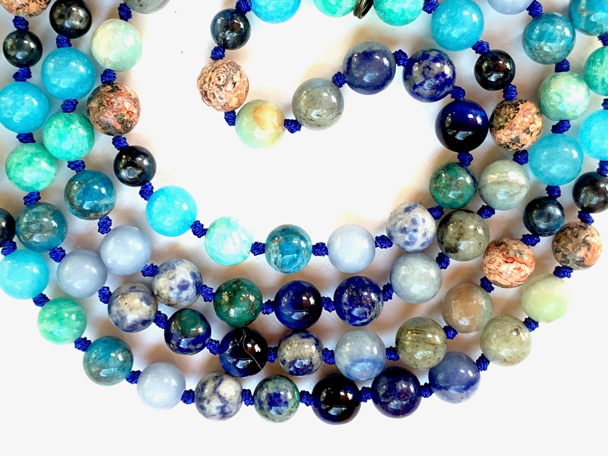 Complete view of 108 bead Sacred Voice Mala with 14 gemstones for communication and voice clarity