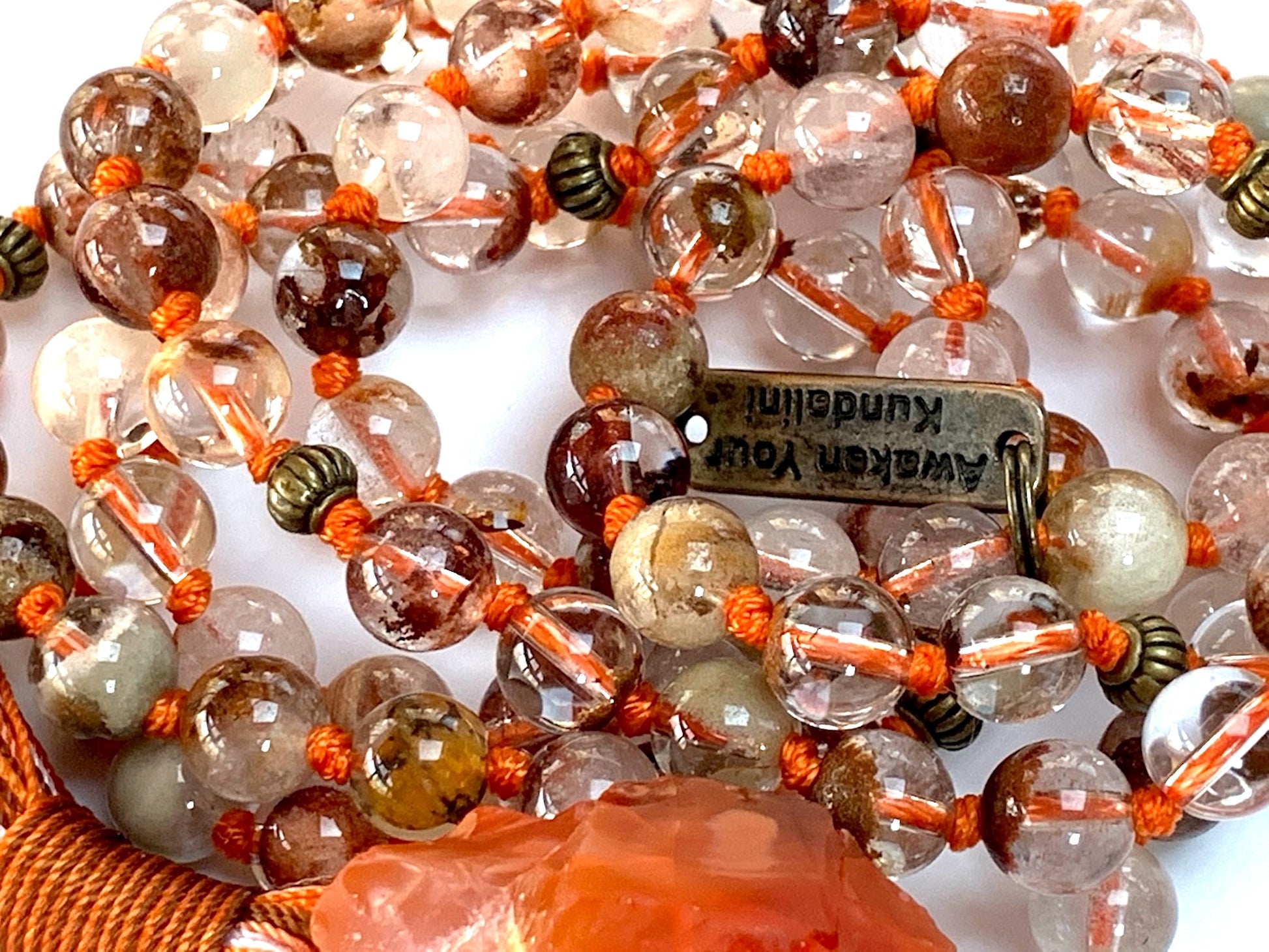 Vision Vitality Mala Necklace worn as luxury spiritual jewelry for transformation and courage