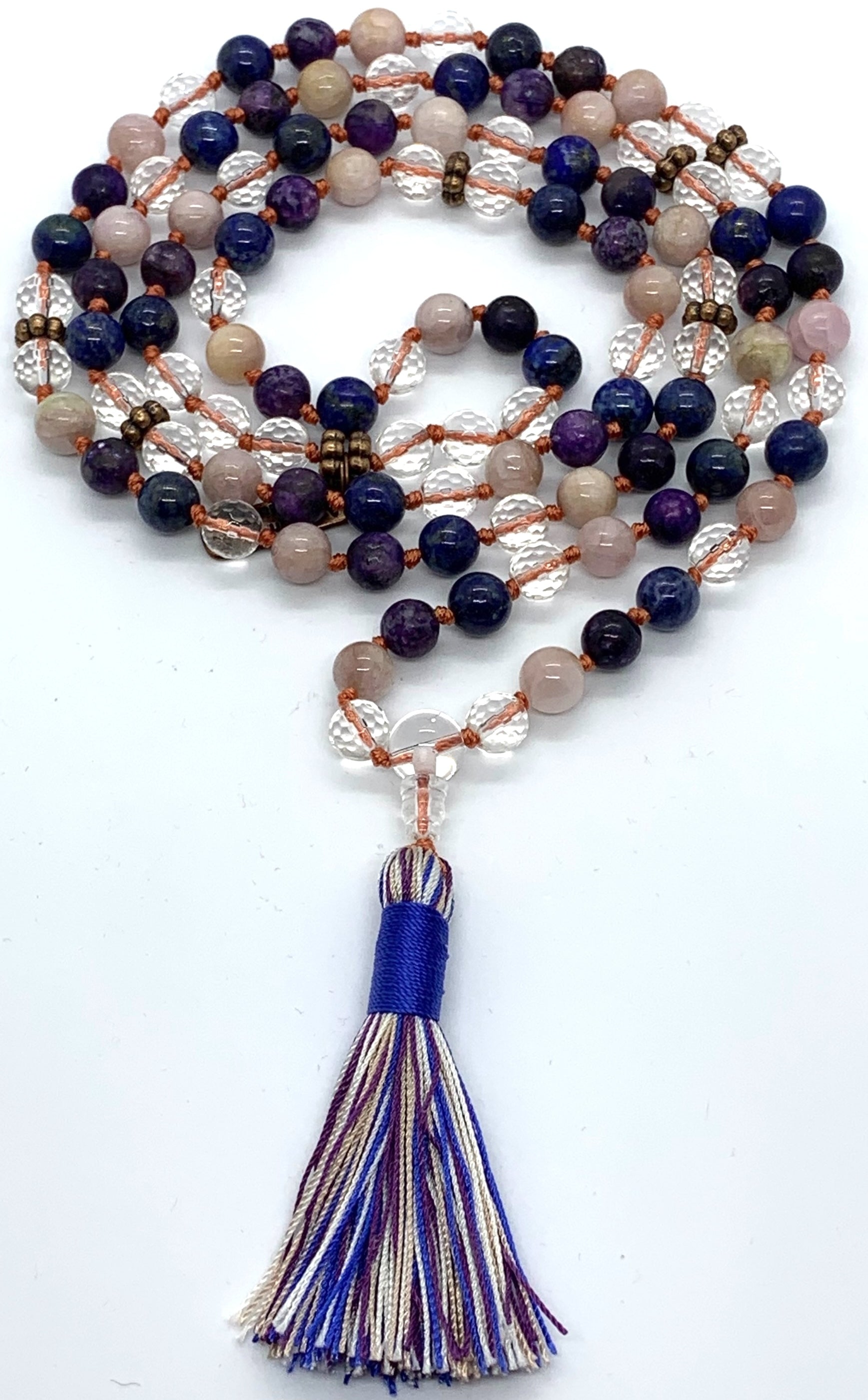 Detail shot of charoite and lapis lazuli beads for courage, wisdom and spiritual transformation