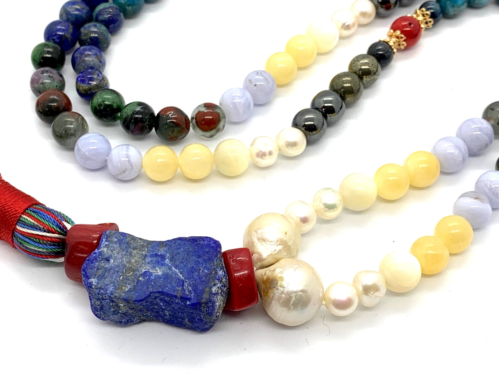 Complete view of 108 bead Cosmic Harmony Mala with 12 gemstones for cosmic alignment and harmony