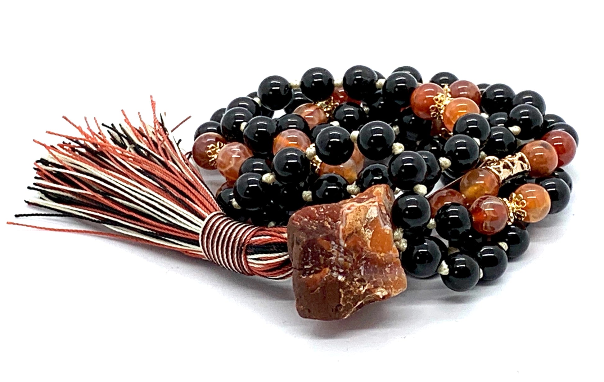 VESTA Collection Inferno Guardian Mala worn as protective spiritual jewelry for strength and passion