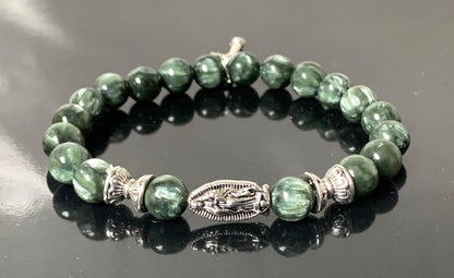 Seraphinite Stretch Bracelet with Choice of Alloy Silver Finish Mother Mary & Holy Cross or Lord Ganesha - Universal Birthstone - Heart & Crown Chakra