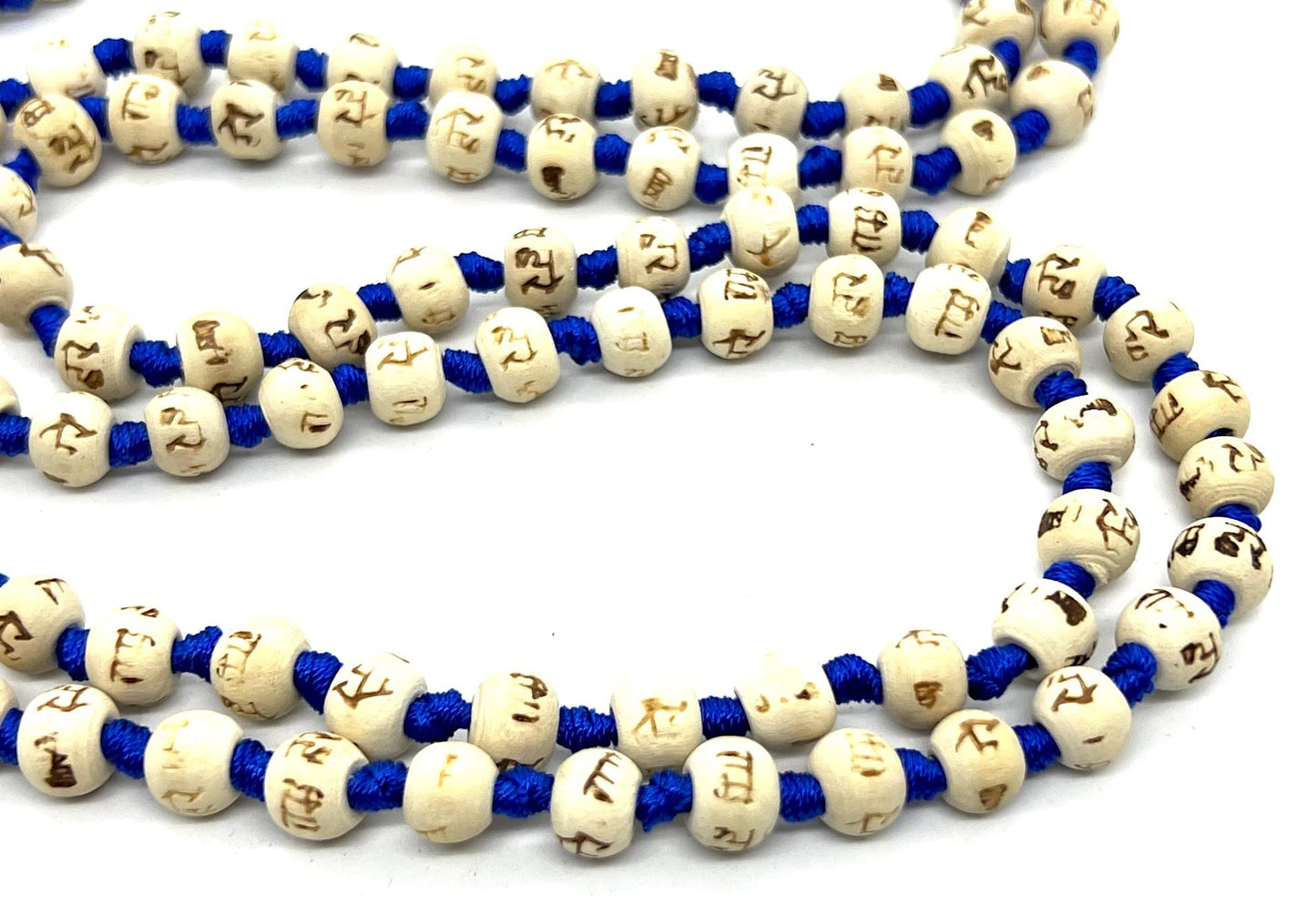 AWAKEN YOUR KUNDALINI Hand Knotted 8mm Tulsi Mala Necklace - Gemini Sun Sign, Heart Chakra Alignment, Ram Engraving, Blue String & Tassel